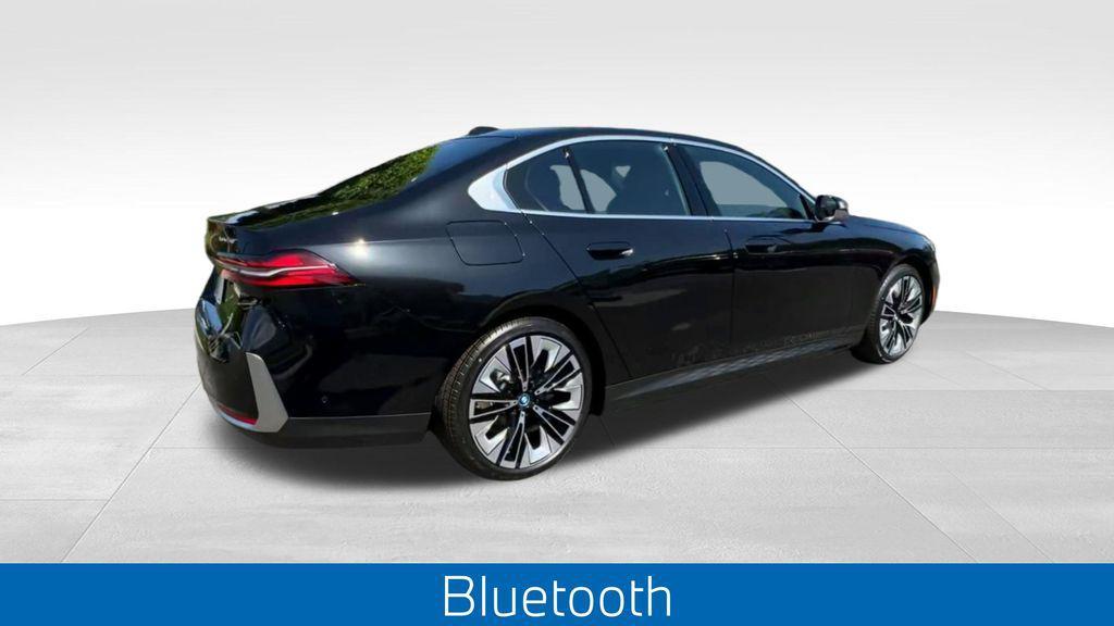 used 2024 BMW i5 car, priced at $60,083