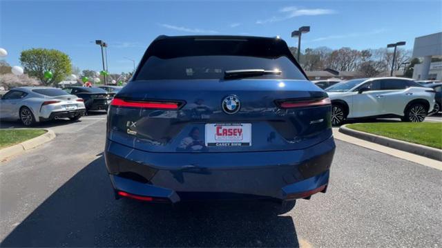 new 2024 BMW iX car, priced at $92,288