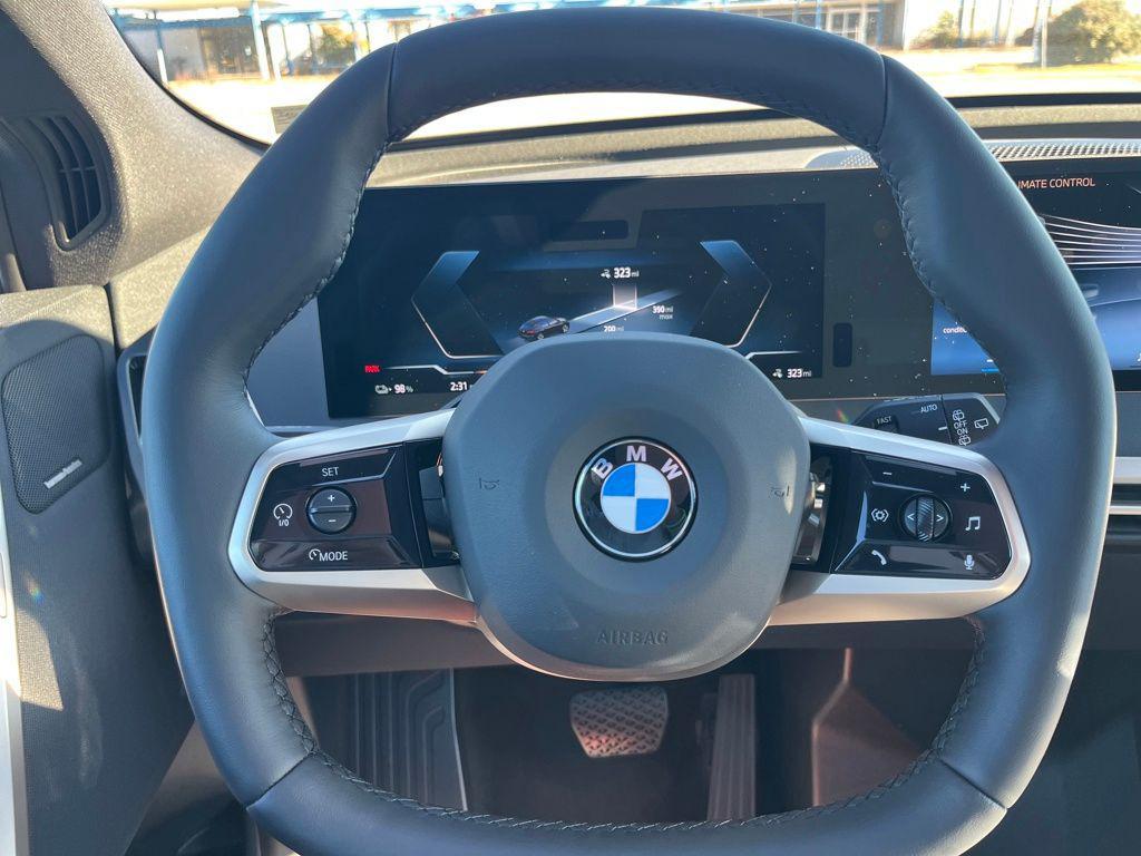 new 2026 BMW iX car, priced at $97,020