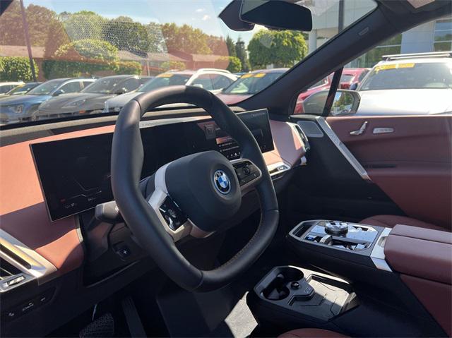 new 2025 BMW iX car, priced at $105,470
