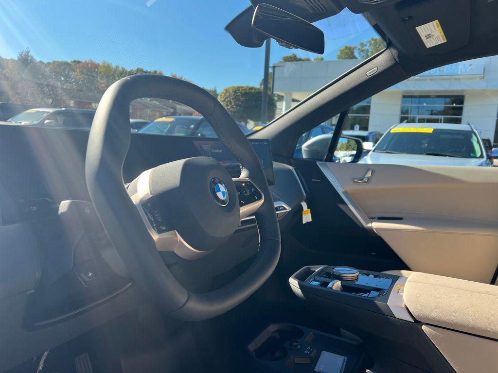 new 2026 BMW iX car, priced at $83,920