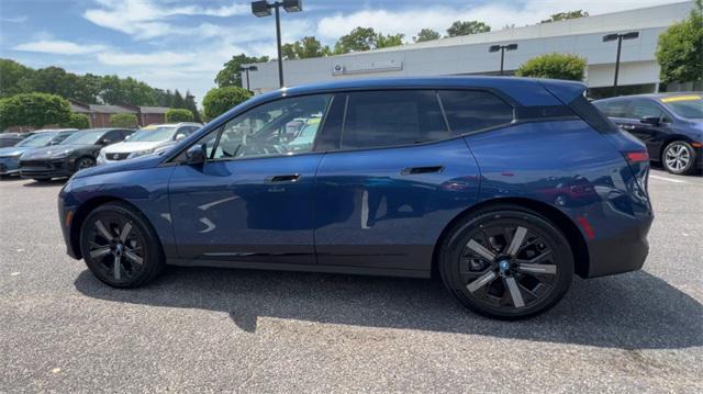 new 2025 BMW iX car, priced at $97,425