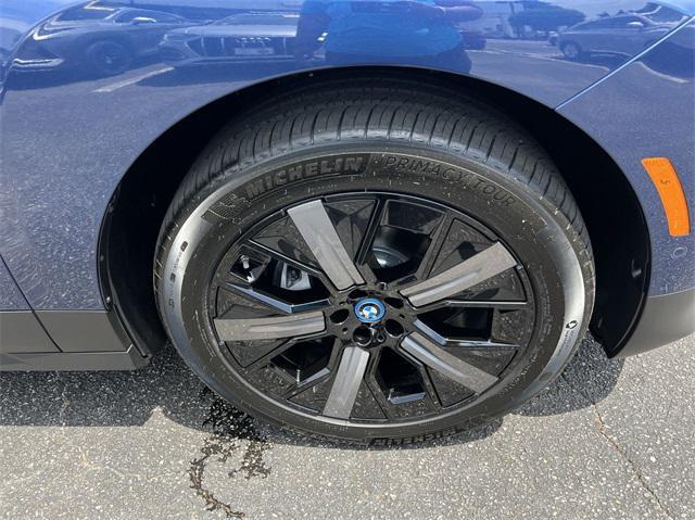 new 2025 BMW iX car, priced at $97,425