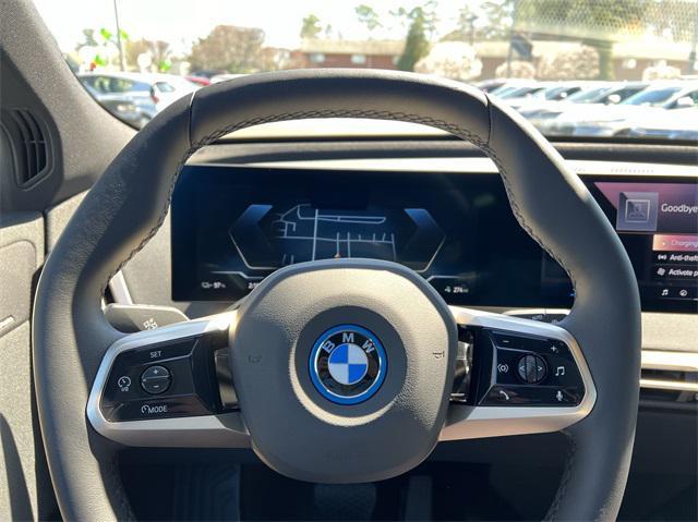 new 2024 BMW iX car, priced at $94,954