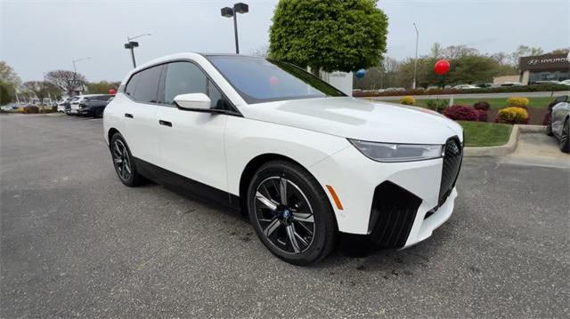 new 2024 BMW iX car, priced at $89,396