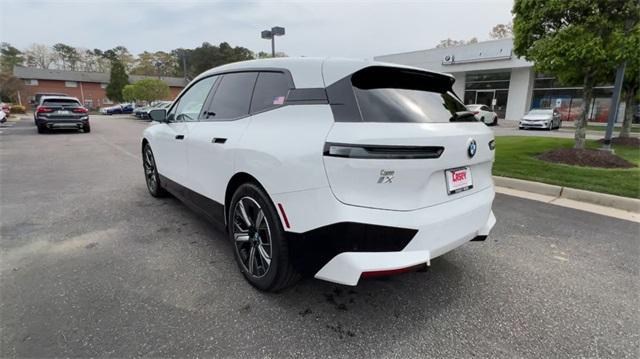 new 2024 BMW iX car, priced at $89,396