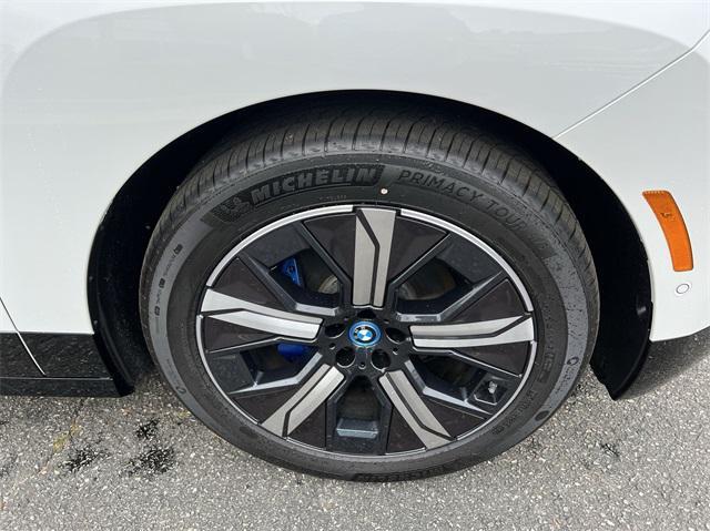 new 2024 BMW iX car, priced at $89,396