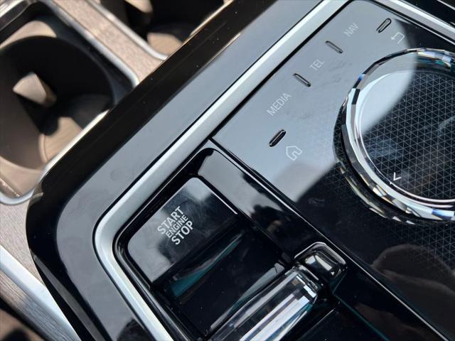 new 2025 BMW 740 car, priced at $100,945