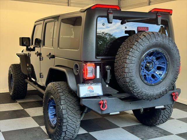 used 2014 Jeep Wrangler Unlimited car, priced at $20,900