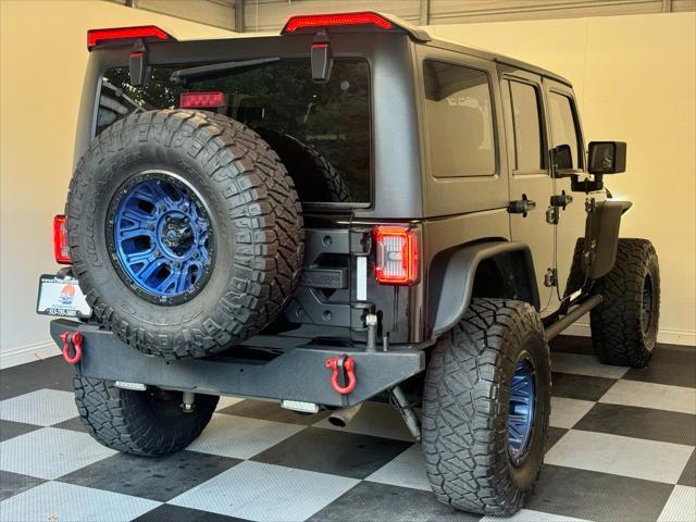 used 2014 Jeep Wrangler Unlimited car, priced at $20,900