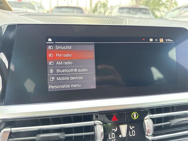 used 2021 BMW 330 car, priced at $18,898