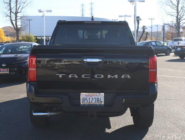 used 2024 Toyota Tacoma car, priced at $49,750