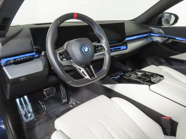 used 2024 BMW i5 car, priced at $70,495