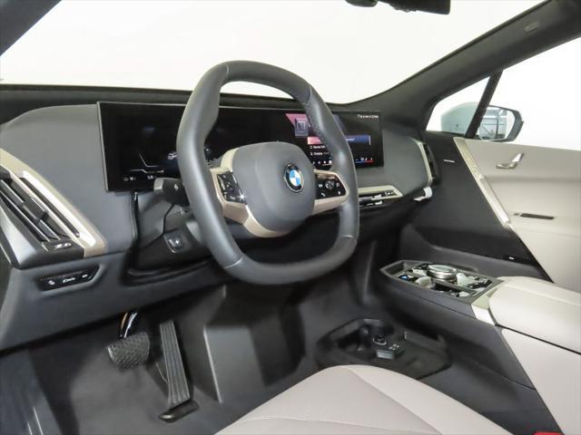 new 2026 BMW iX car, priced at $93,170