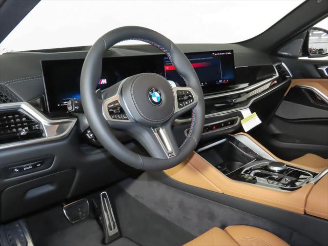 new 2025 BMW X6 car, priced at $98,905