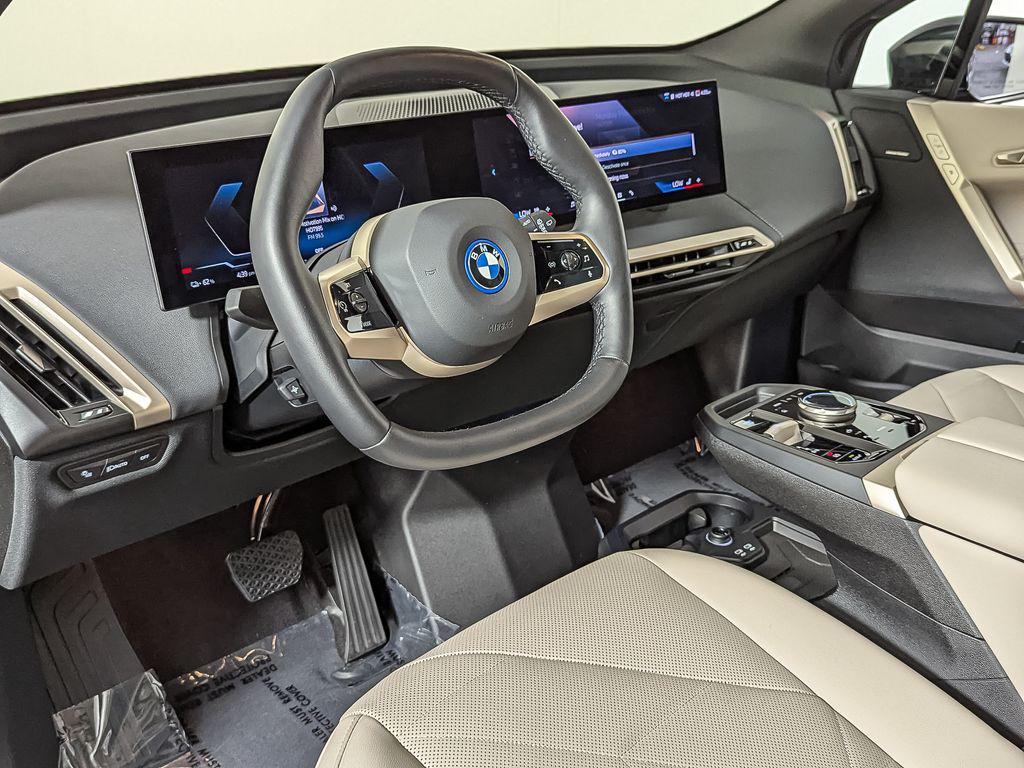 used 2025 BMW iX car, priced at $70,995