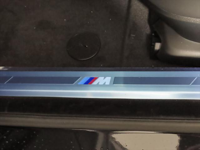new 2025 BMW 740 car, priced at $104,925