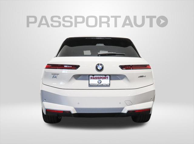 new 2026 BMW iX car, priced at $84,020