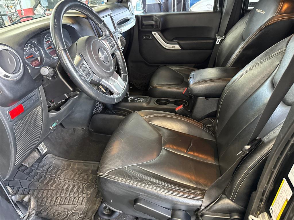 used 2015 Jeep Wrangler Unlimited car, priced at $16,930