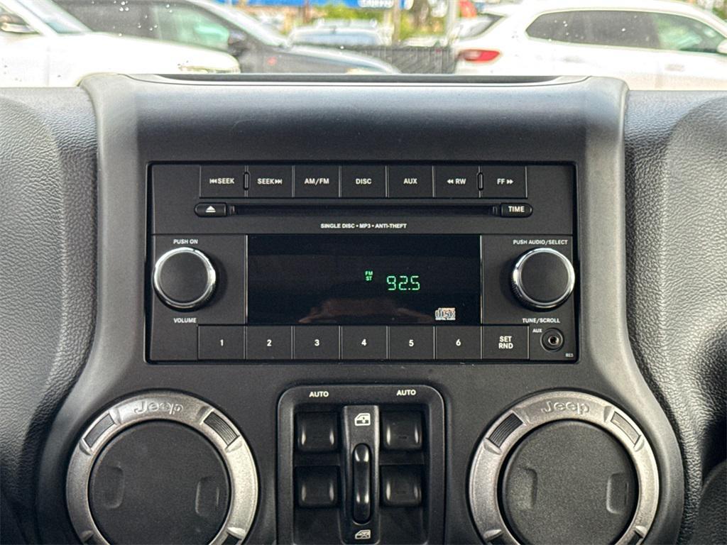 used 2014 Jeep Wrangler Unlimited car, priced at $18,777