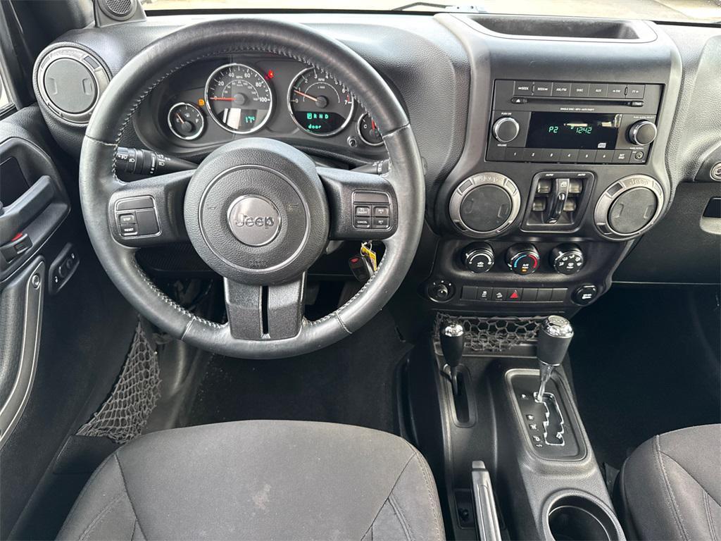 used 2014 Jeep Wrangler Unlimited car, priced at $18,777