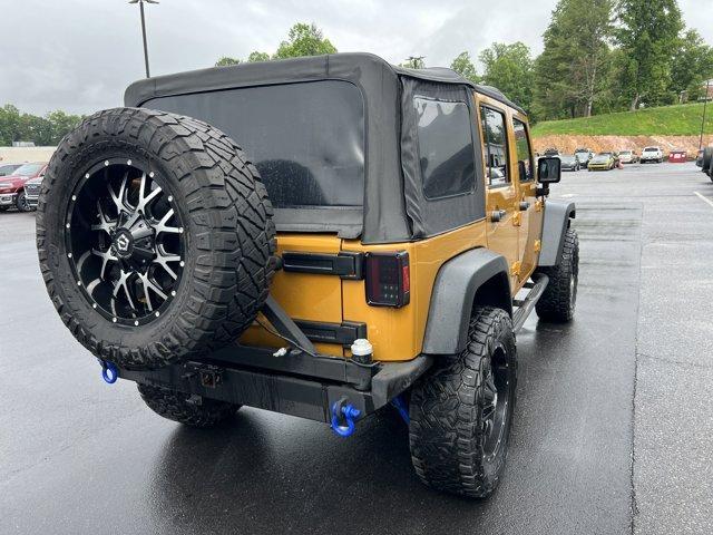 used 2014 Jeep Wrangler Unlimited car, priced at $19,793