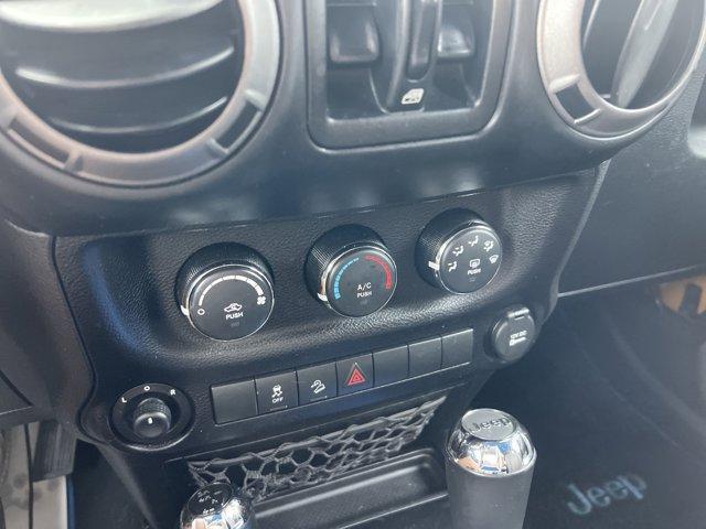 used 2014 Jeep Wrangler Unlimited car, priced at $19,793