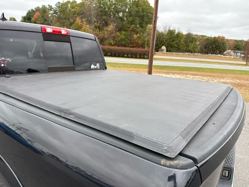 used 2016 Ram 1500 car, priced at $27,344