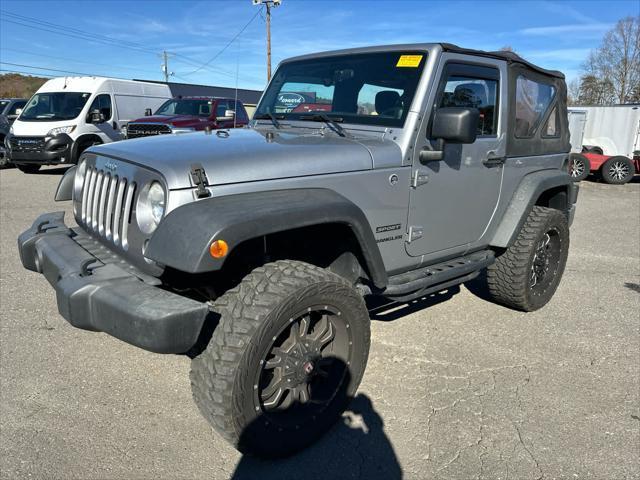 used 2014 Jeep Wrangler car, priced at $15,997