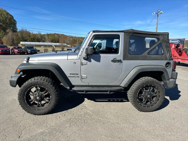 used 2014 Jeep Wrangler car, priced at $15,997