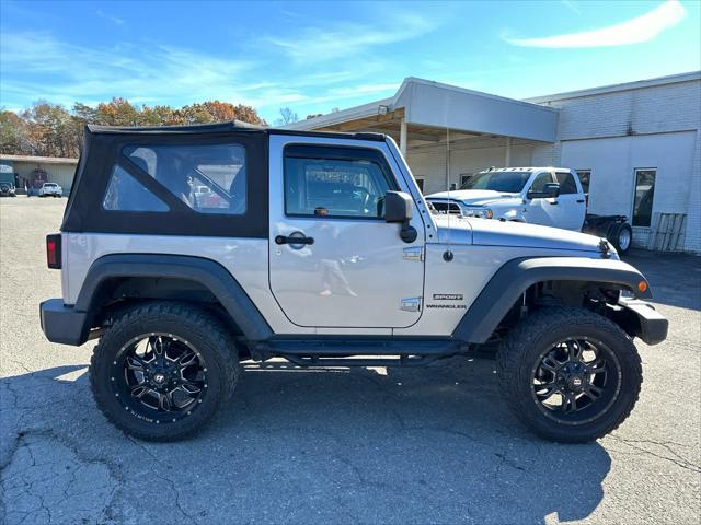 used 2014 Jeep Wrangler car, priced at $15,997