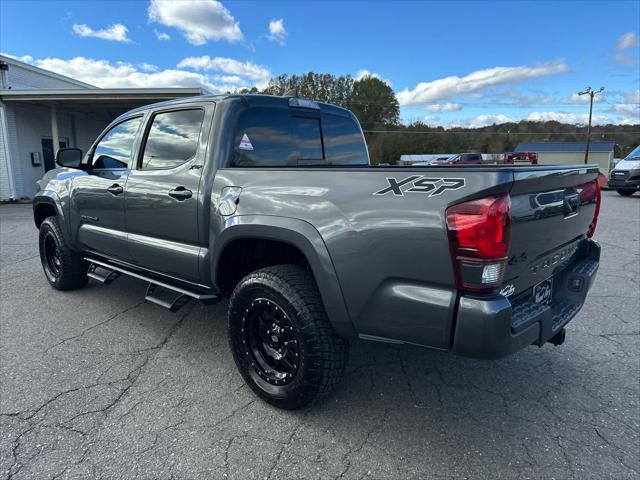 used 2019 Toyota Tacoma car, priced at $27,997