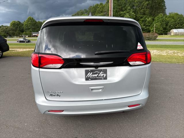 used 2023 Chrysler Voyager car, priced at $22,597