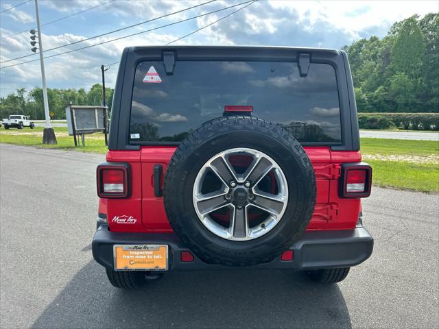 used 2021 Jeep Wrangler Unlimited car, priced at $32,687