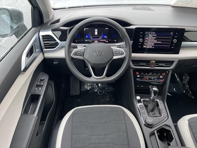 new 2025 Volkswagen Taos car, priced at $30,937