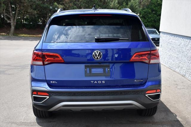 used 2023 Volkswagen Taos car, priced at $25,681