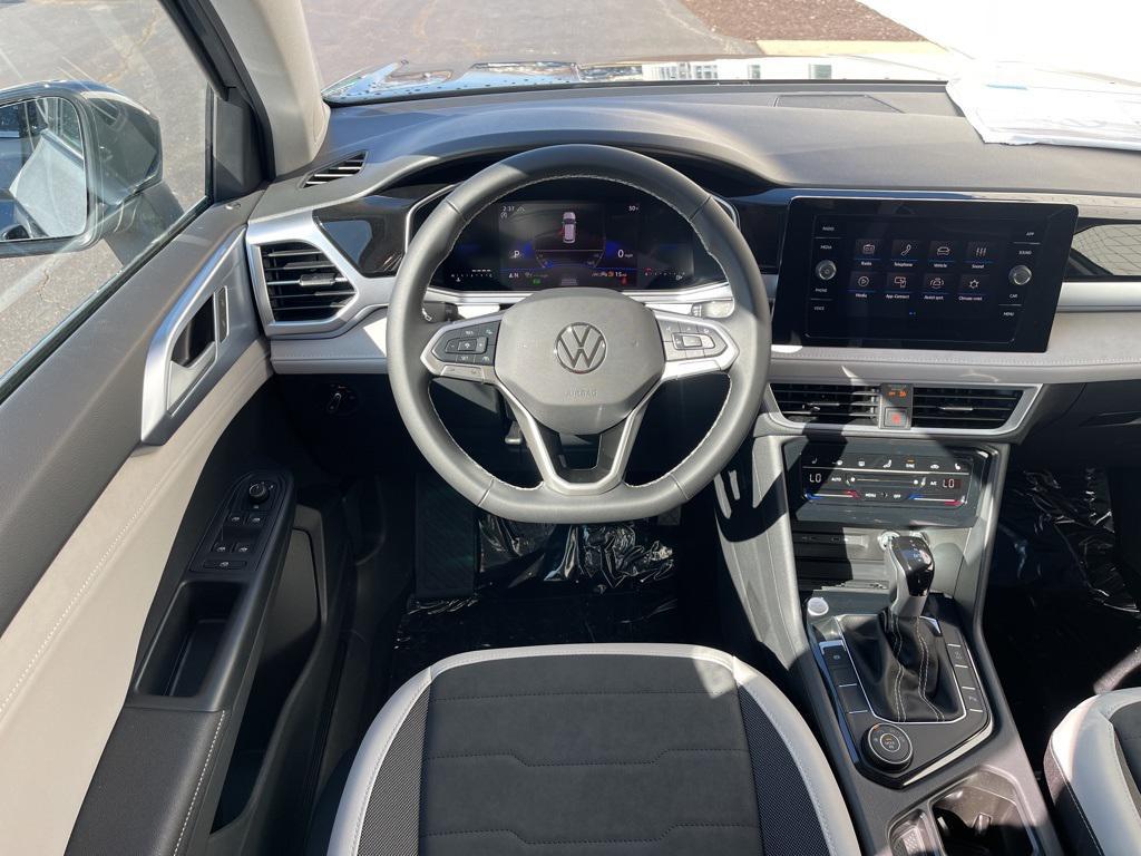 new 2025 Volkswagen Taos car, priced at $30,937