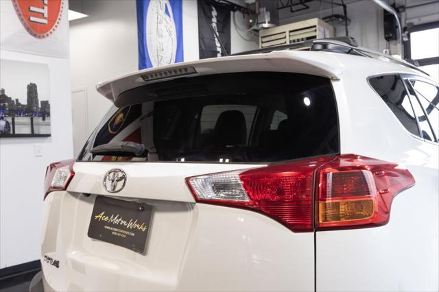 used 2013 Toyota RAV4 car, priced at $14,999