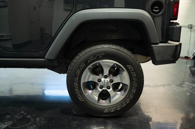 used 2018 Jeep Wrangler JK Unlimited car, priced at $22,999