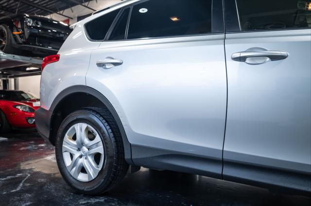 used 2015 Toyota RAV4 car, priced at $14,999