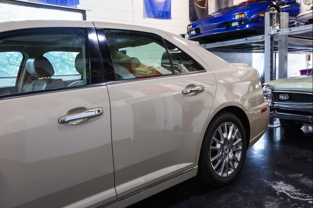 used 2011 Cadillac STS car, priced at $7,800