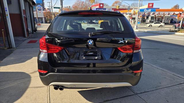 used 2013 BMW X1 car, priced at $14,990