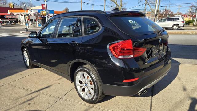 used 2013 BMW X1 car, priced at $14,990