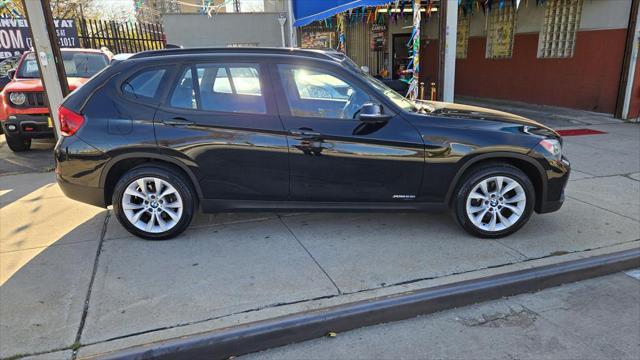 used 2013 BMW X1 car, priced at $14,990