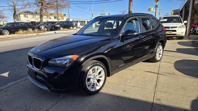 used 2013 BMW X1 car, priced at $14,990