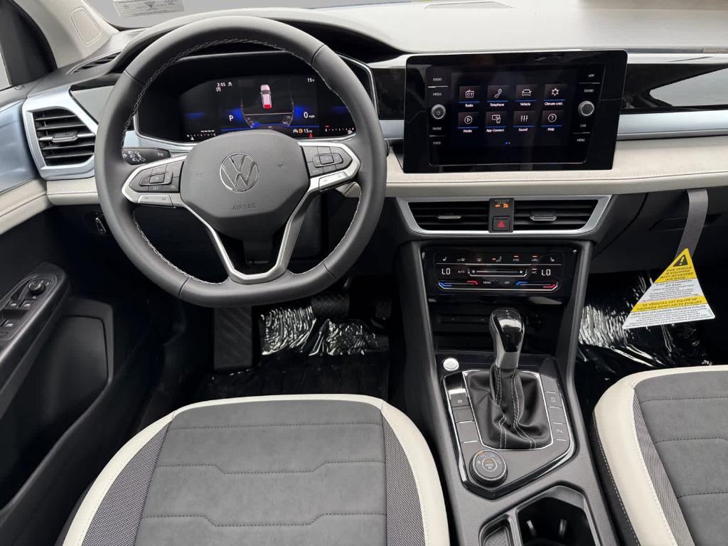 new 2025 Volkswagen Taos car, priced at $31,311