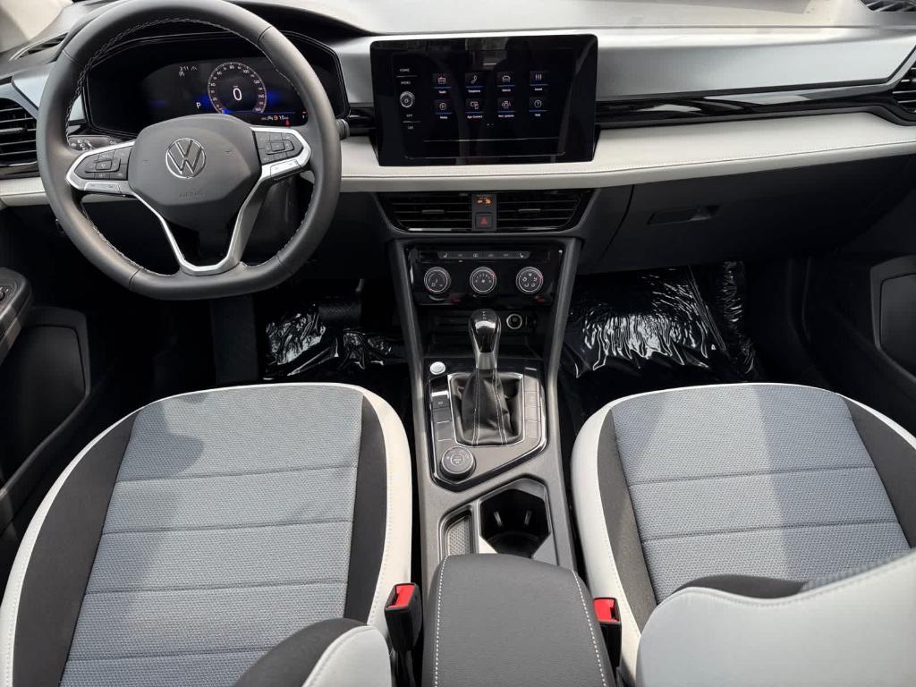 new 2025 Volkswagen Taos car, priced at $26,821