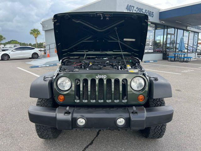 used 2010 Jeep Wrangler Unlimited car, priced at $11,990