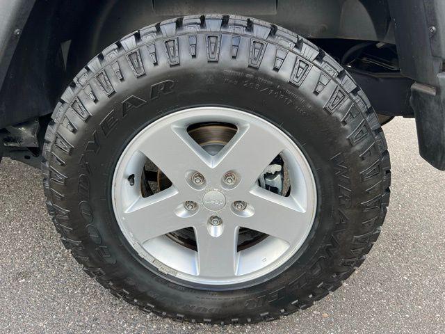 used 2010 Jeep Wrangler Unlimited car, priced at $11,990