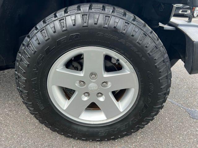 used 2010 Jeep Wrangler Unlimited car, priced at $11,990